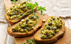 Pan-Grilled New York Strip Steaks with Green Olive Tapenade