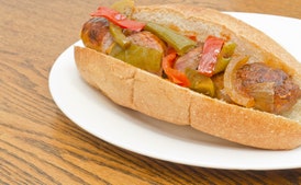 Grilled Sausages, Peppers, and Onions on Rolls