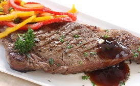 Top Sirloin Steak with Bell Pepper and Onion Sauté